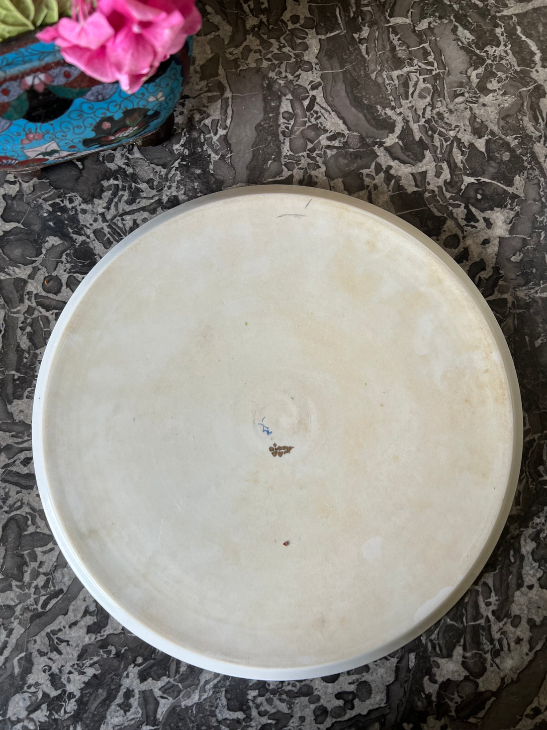 Plat rond XIXème en porcelaine de Paris