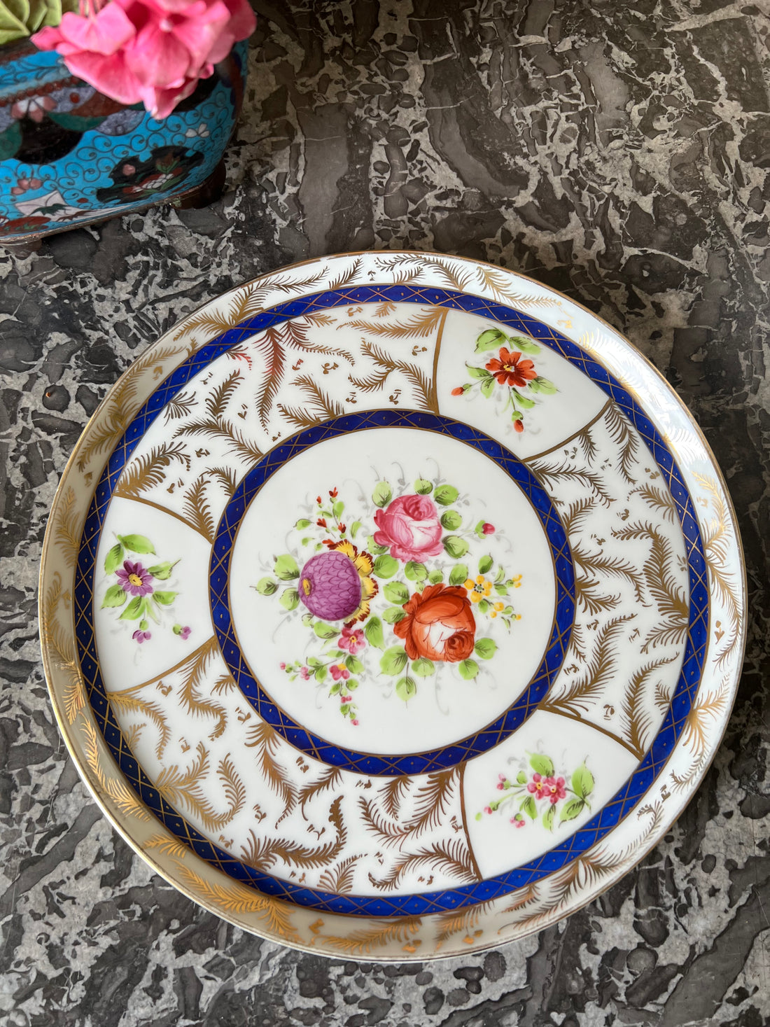 Plat rond XIXème en porcelaine de Paris