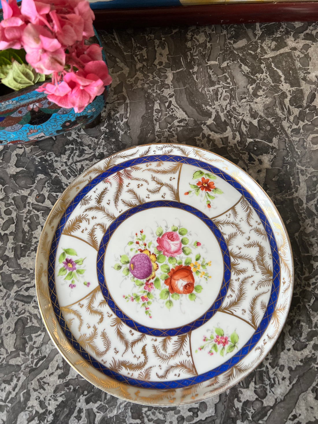 Plat rond XIXème en porcelaine de Paris