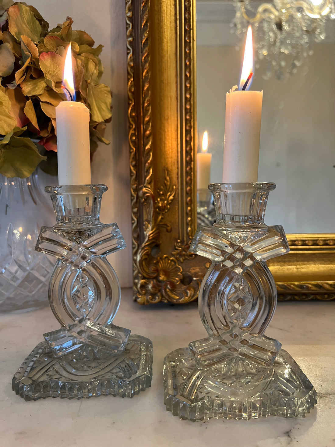 Paire de bougeoirs en verre vintage