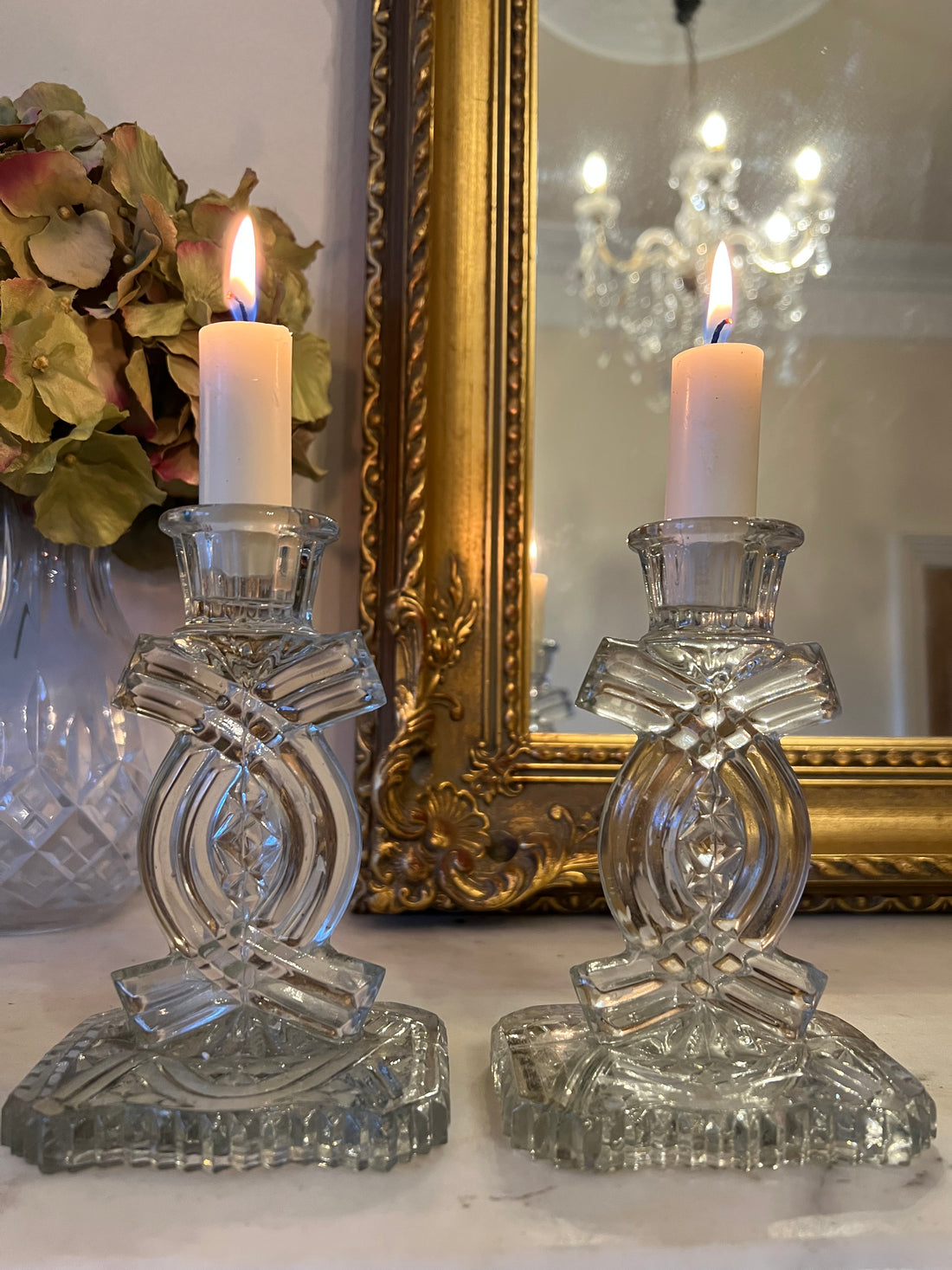 Paire de bougeoirs en verre vintage