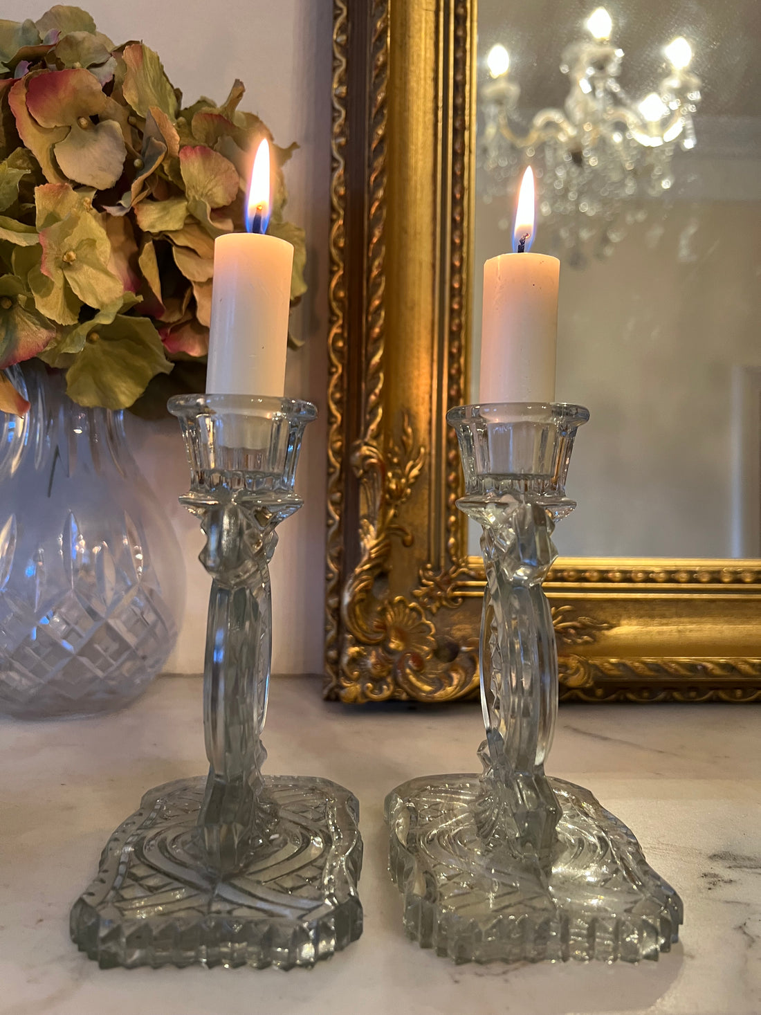 Paire de bougeoirs en verre vintage